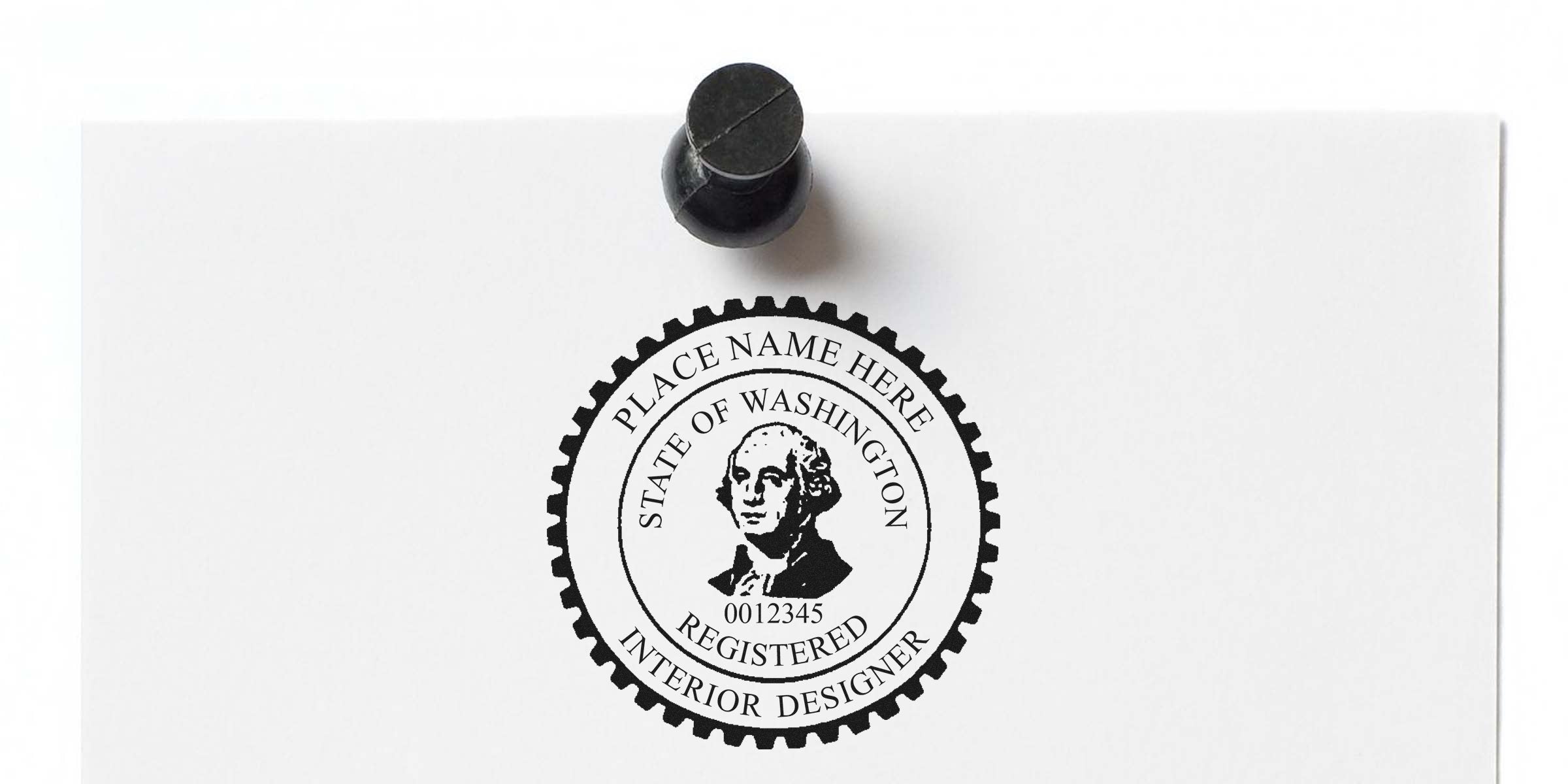 Registered interior designer seal with George Washington portrait and place name on white paper, pinned with a black thumbtack, illustrating Washington interior design and stamp design rules.