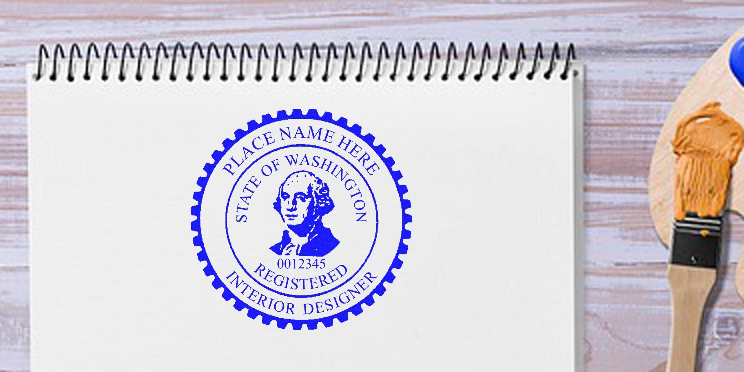 Washington State interior designer seal stamp on white notebook with paintbrush and palette, revealing seal design secrets.