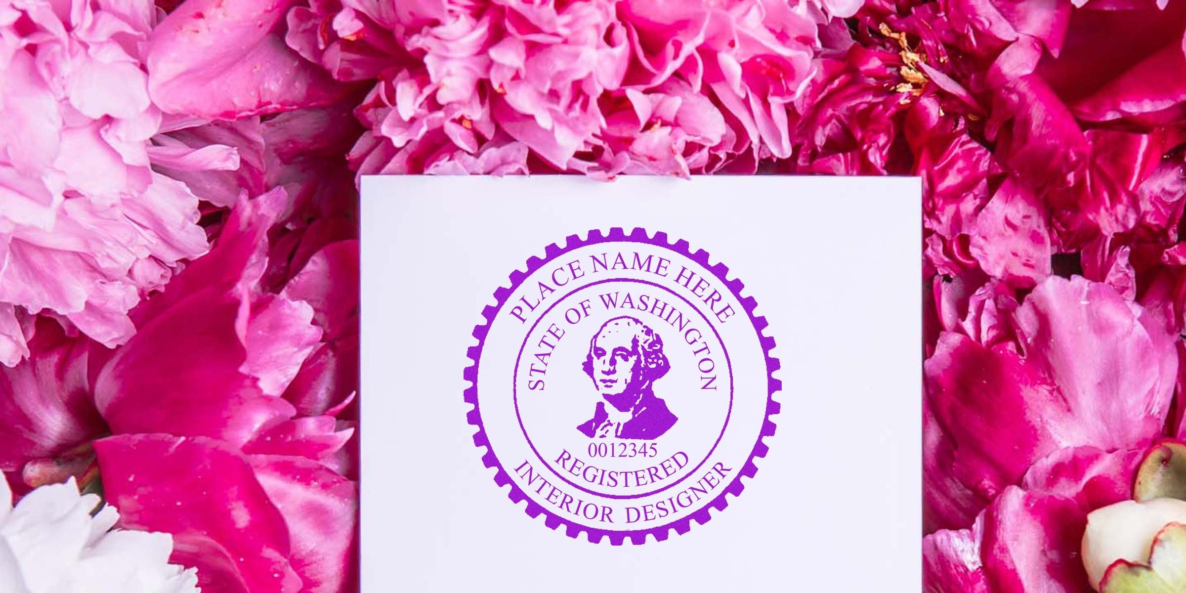 Registered interior designer seal on white paper with pink petals, showing Washington interior designer license and design stamp details.
