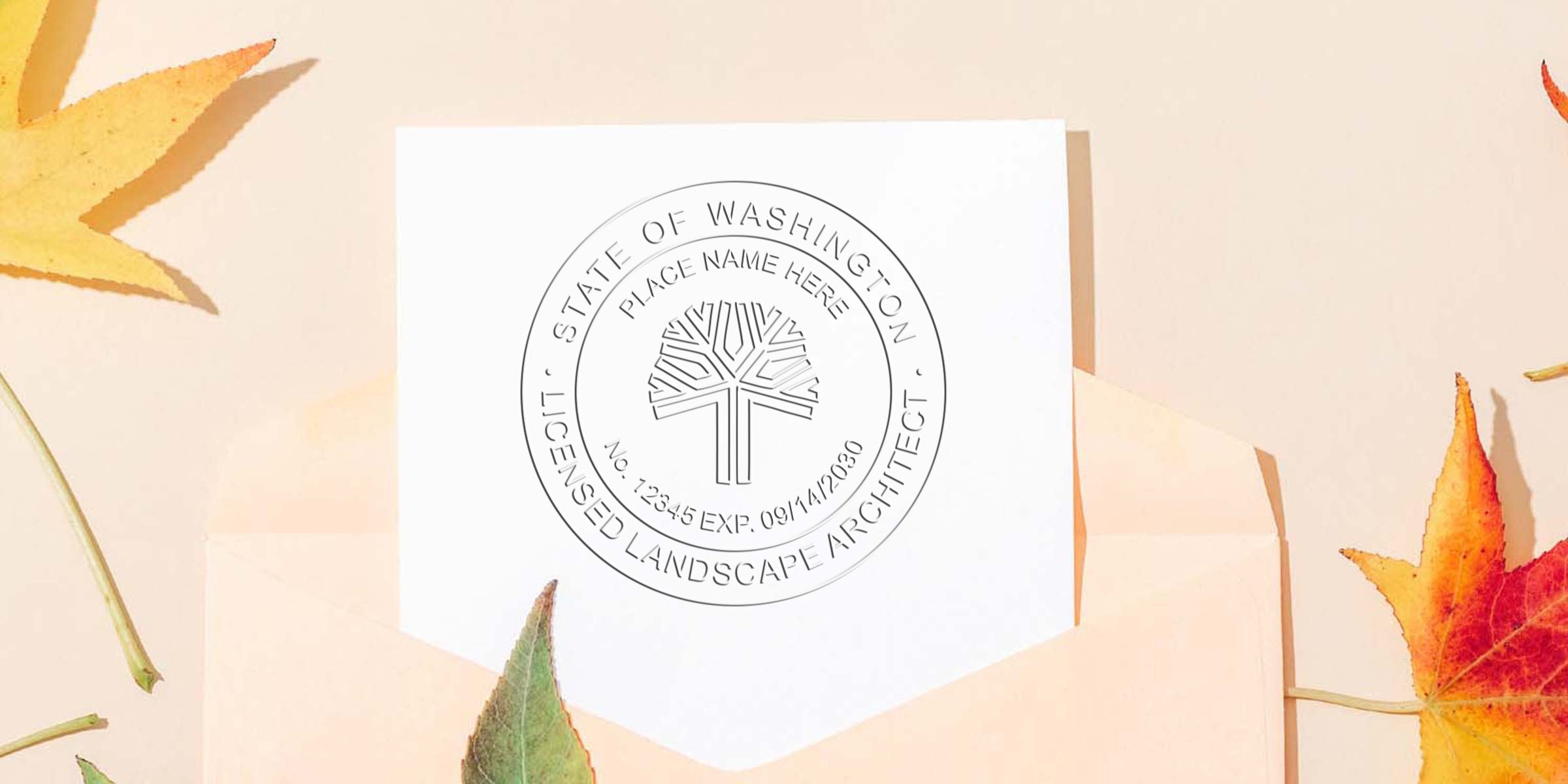 Washington licensed landscape architect seal on white paper with autumn leaves, featuring Washington and custom landscape architect stamps.