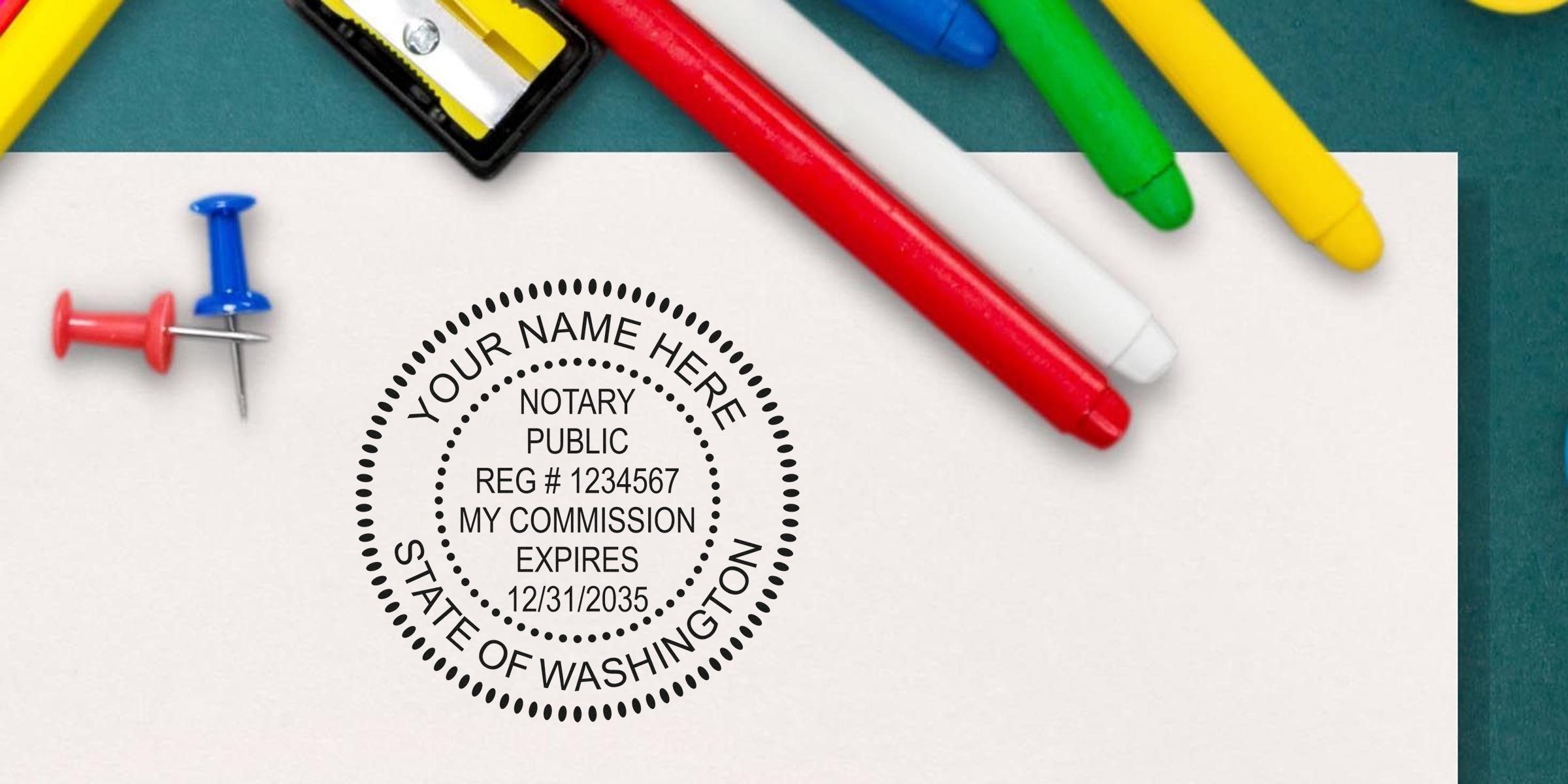 Washington notary seal stamps on paper, surrounded by colorful markers and push pins, showcasing top notary stamps for official public notary services in Washington.
