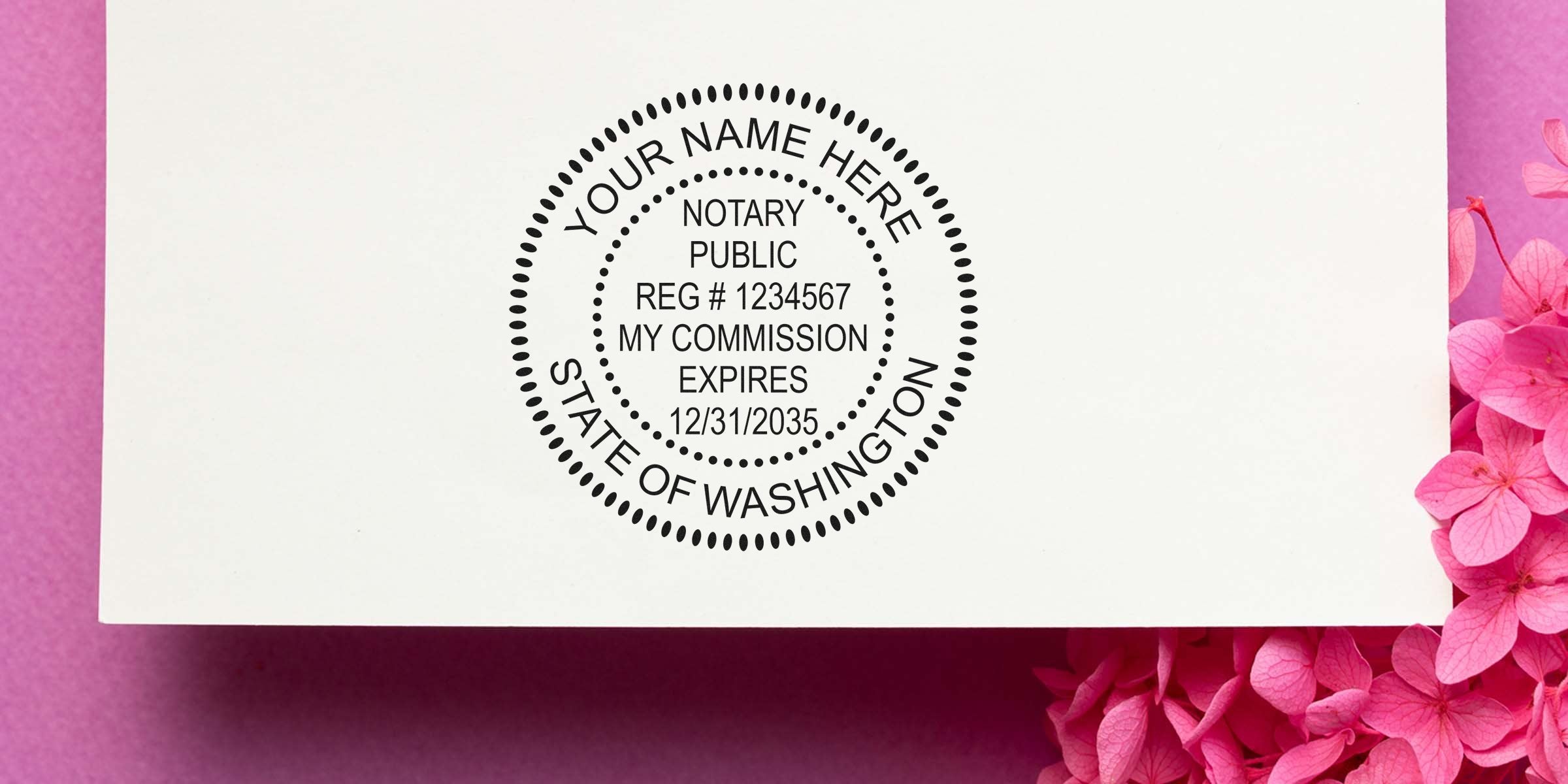 Custom Washington Notary Public Seal stamp on white paper with pink flowers, showing commission expiration date; includes tips for buying a Notary Seal.
