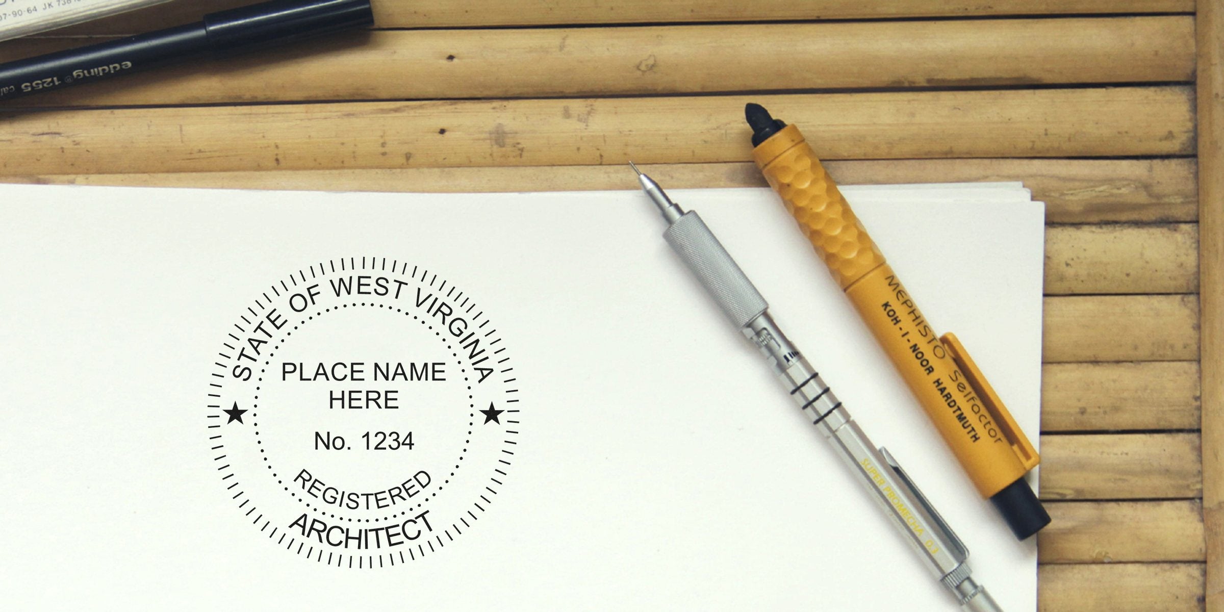 West Virginia architectural stamps with a registered architect seal on paper, accompanied by drafting pens on a wooden table, highlighting WV architectural seals.
