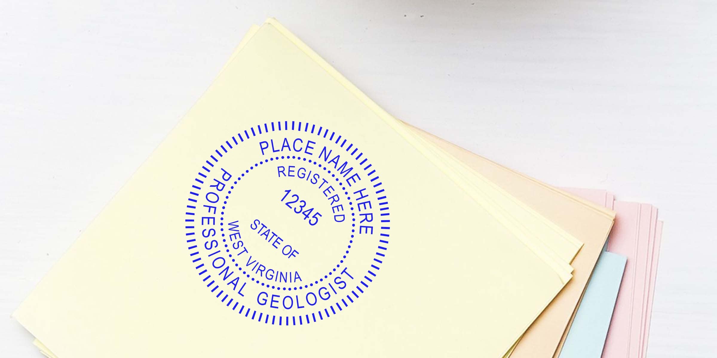 Professional geologist stamp on colored paper stack for West Virginia certification, highlighting common stamp errors and tips for buying geologist stamps.