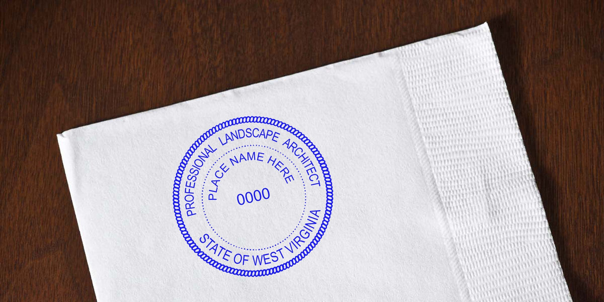 Professional landscape architect seal embosser stamp West Virginia with design tools on white napkin