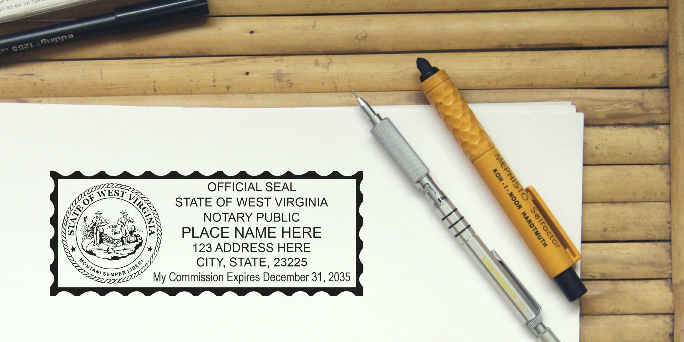 West Virginia notary stamp with self-inking feature, official seal, and pens on a wooden table.