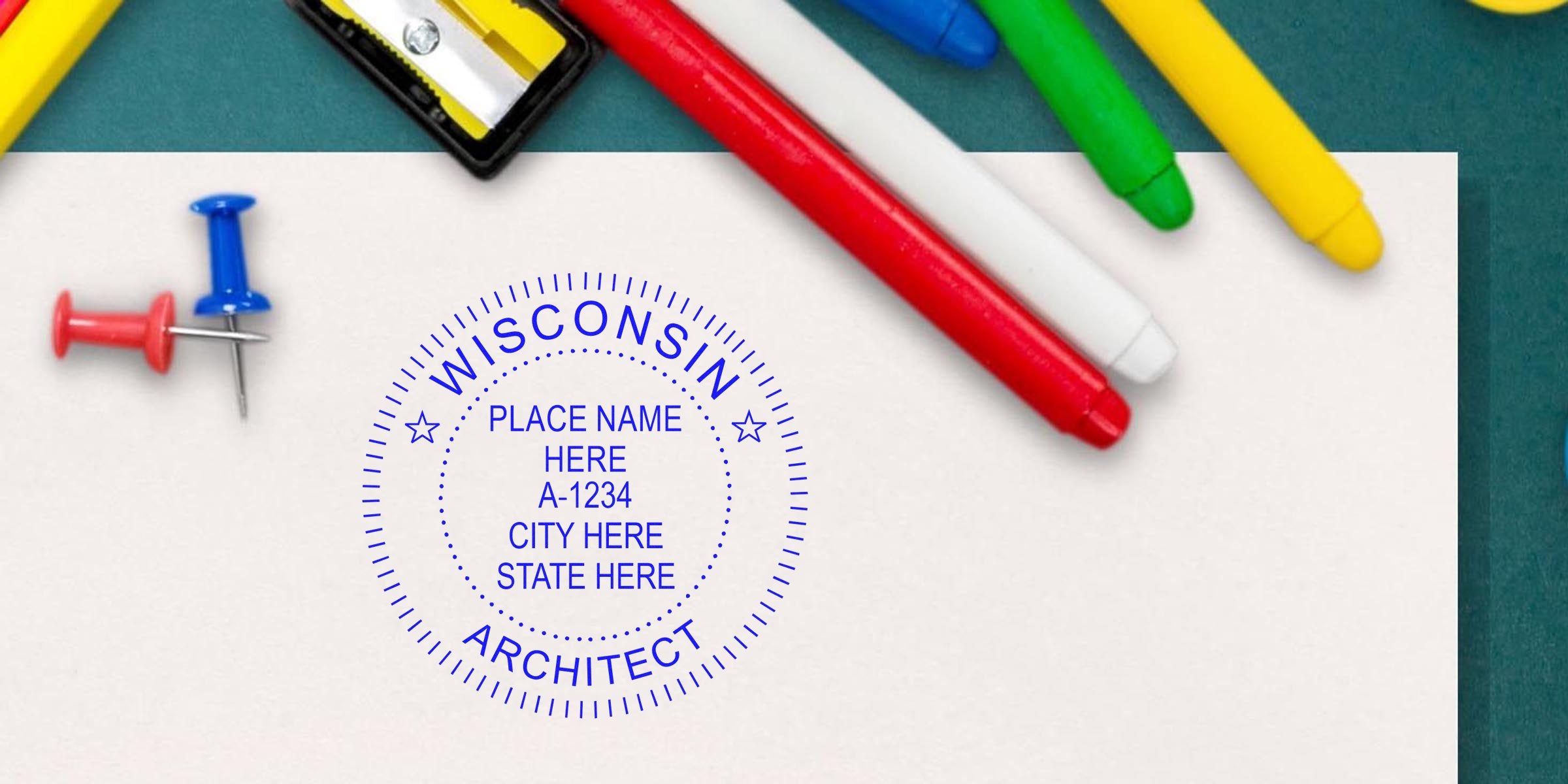 Wisconsin architect stamp on white paper with colorful markers and push pins, showing stamp size and meeting Wisconsin architect seal requirements.