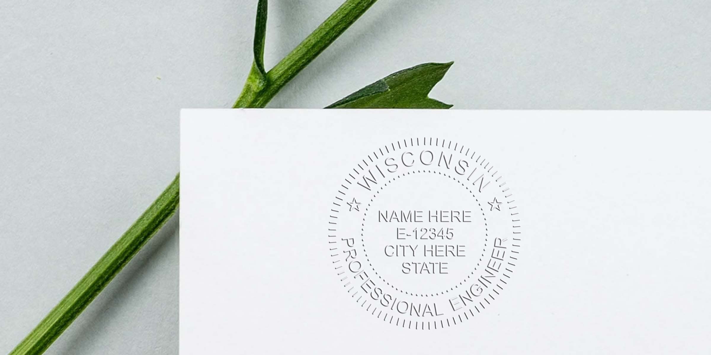Embossed Wisconsin PE seal on white paper with green leaf background, emphasizing Wisconsin PE stamp laws and professional engineer stamp rules.