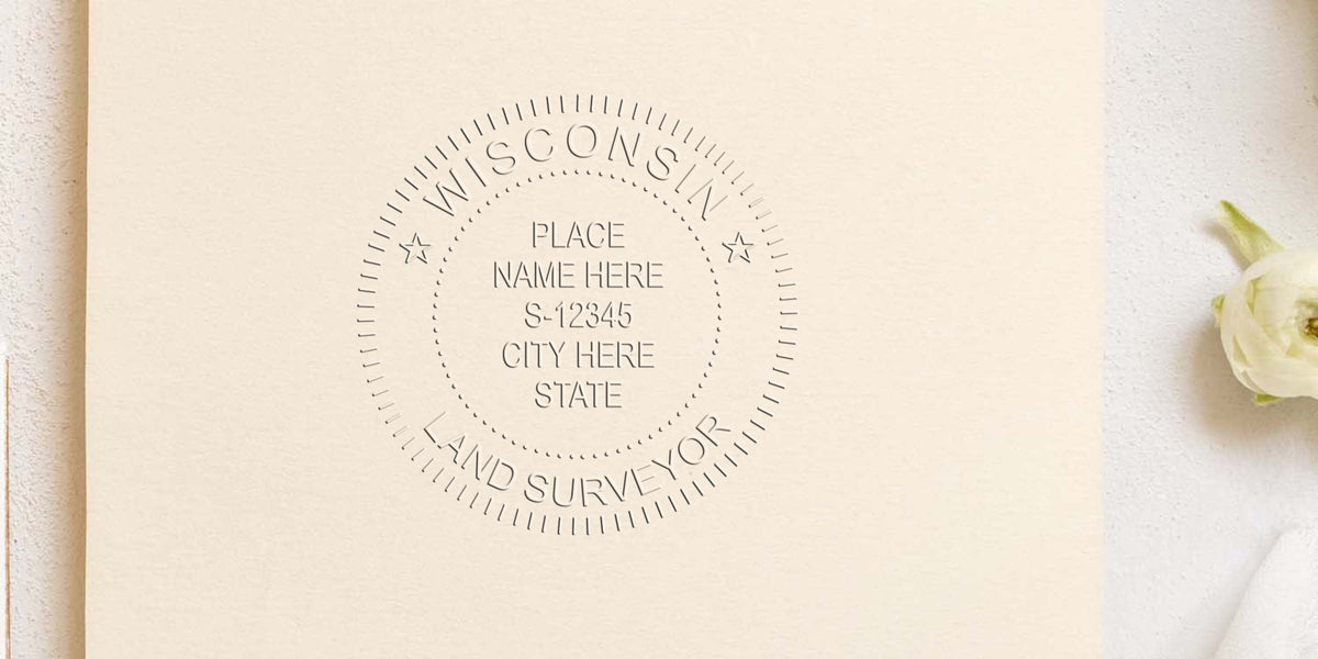 Wisconsin land surveyor seal embossed on cream paper with flower on white textured background, highlighting surveyor seal crafting tips.