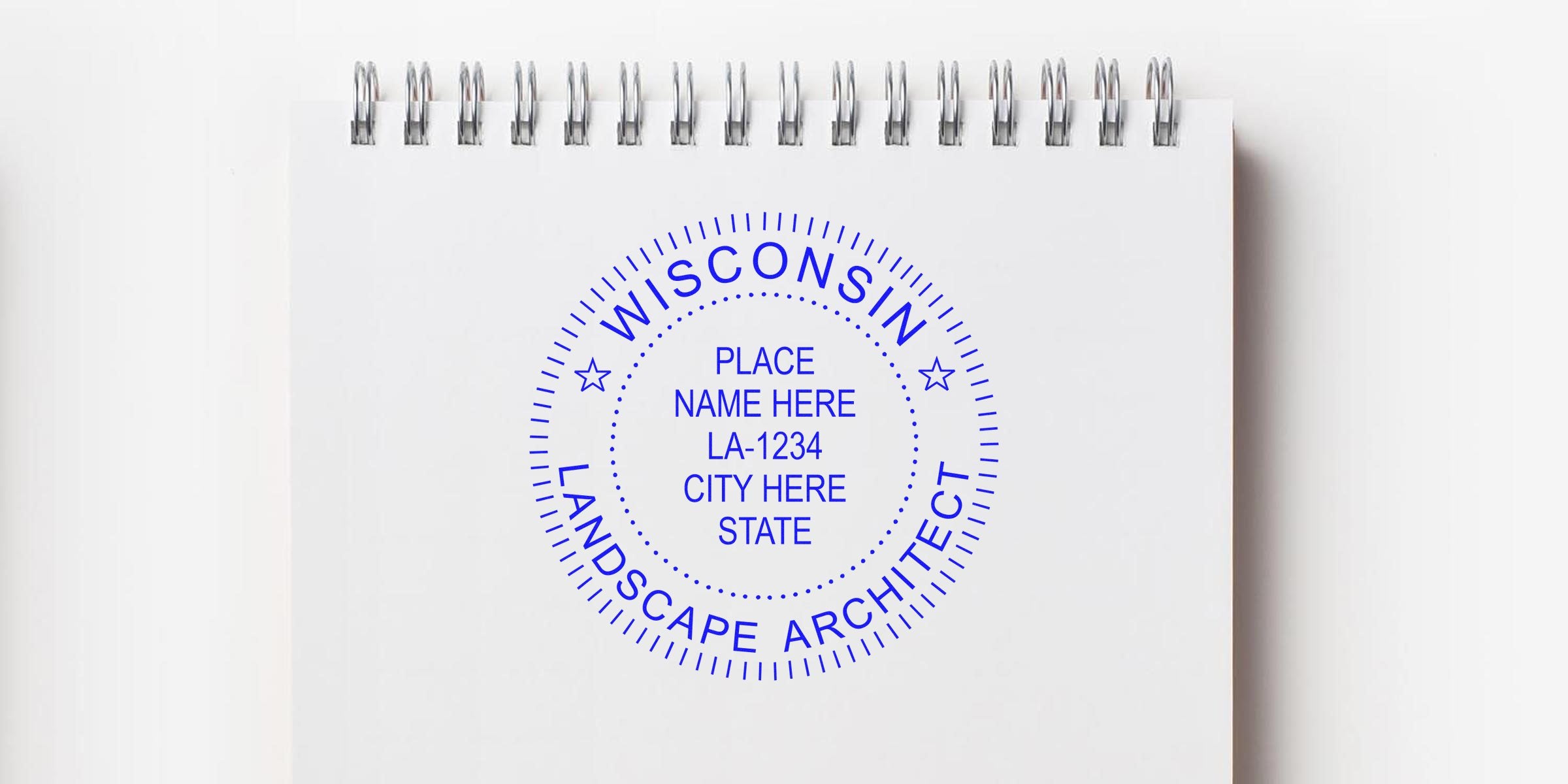 Wisconsin Landscape Architect Seal on white spiral notebook with customizable place and city name, symbolizing Landscape Architect Licensing in Wisconsin.