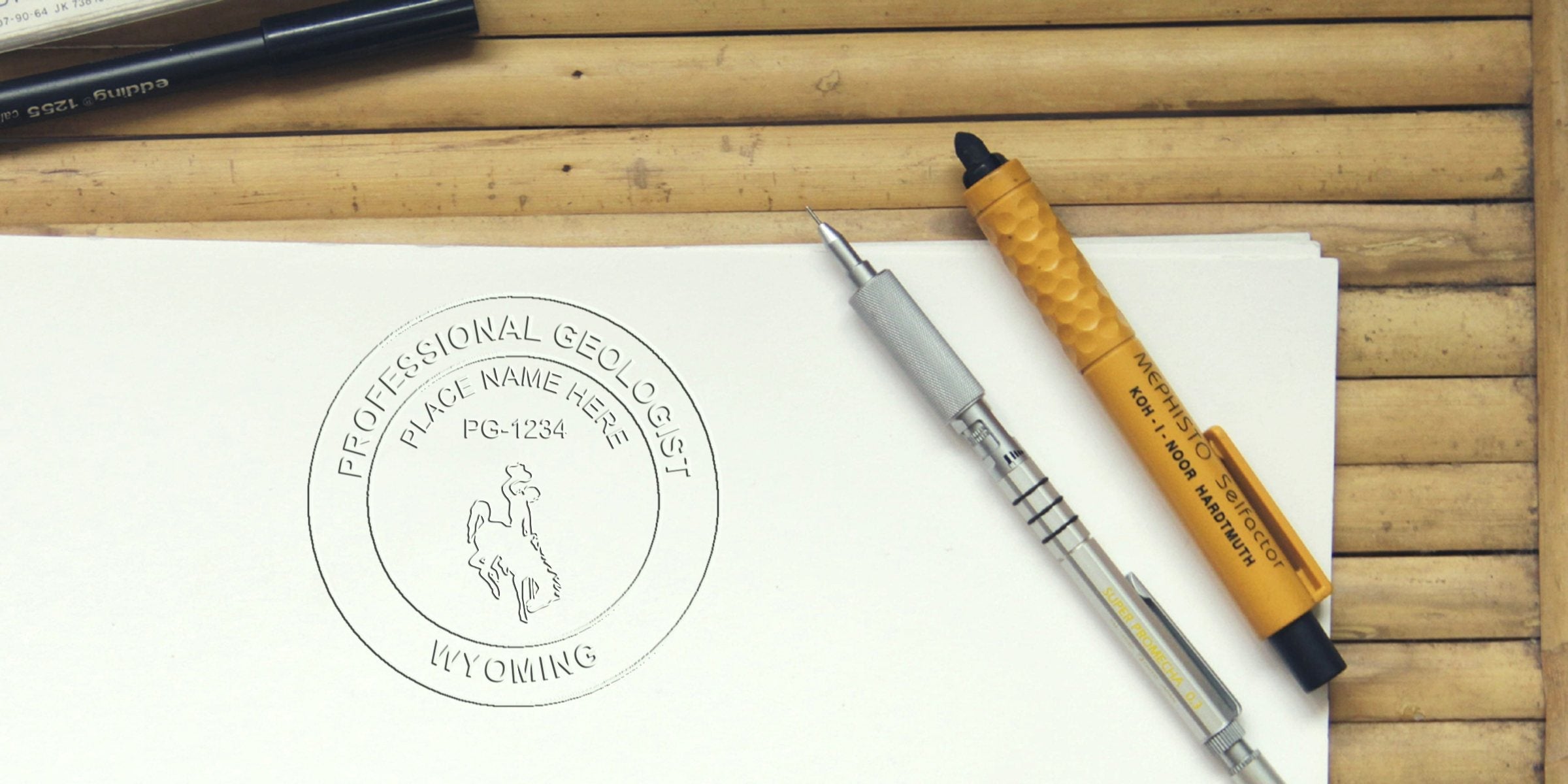 Wyoming Geologist Stamp on paper with drafting tools, highlighting professional certification and licensing, available at top online deals.