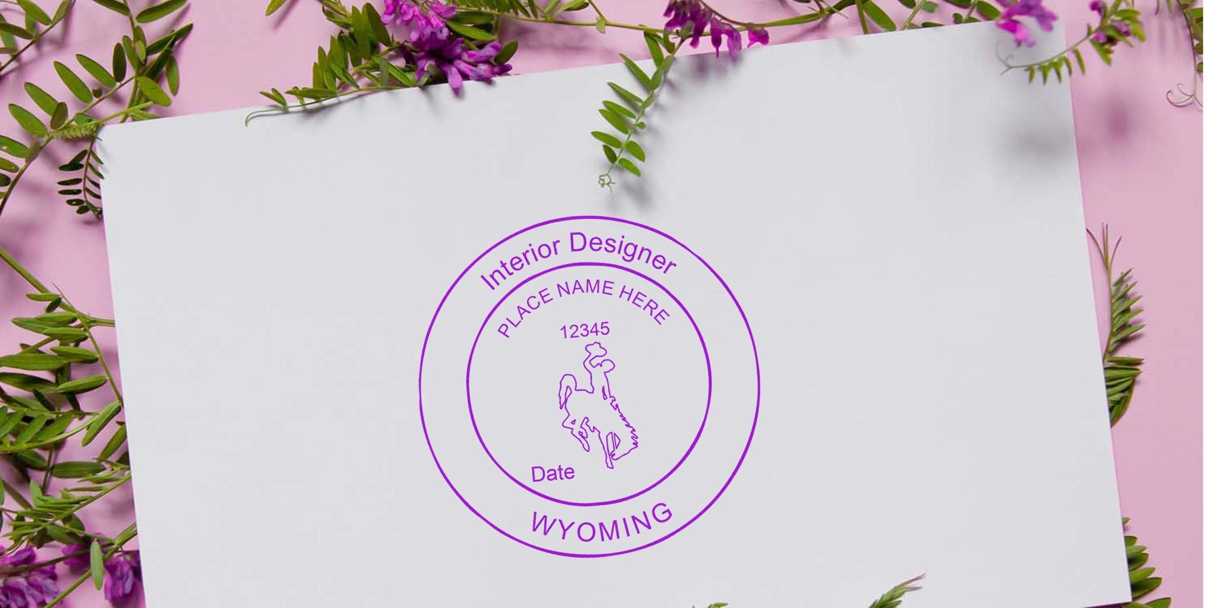 Custom Wyoming interior designer stamp on white paper with floral design, showcasing Wyoming interior designer stamp cost and pricing.