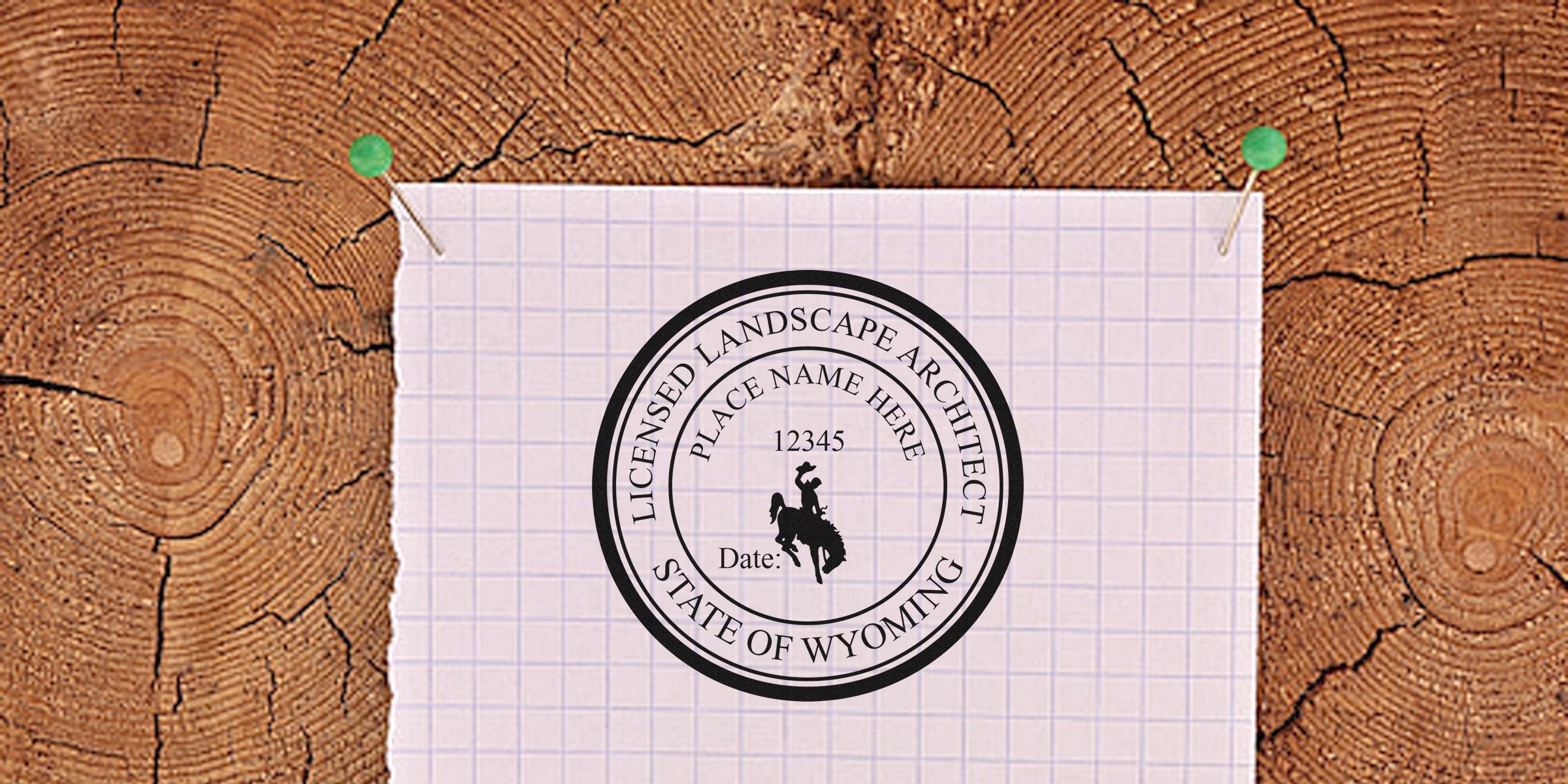 Wyoming licensed landscape architect seal on pinned paper with wood background, highlighting state regulations and stamp requirements for landscape architects.