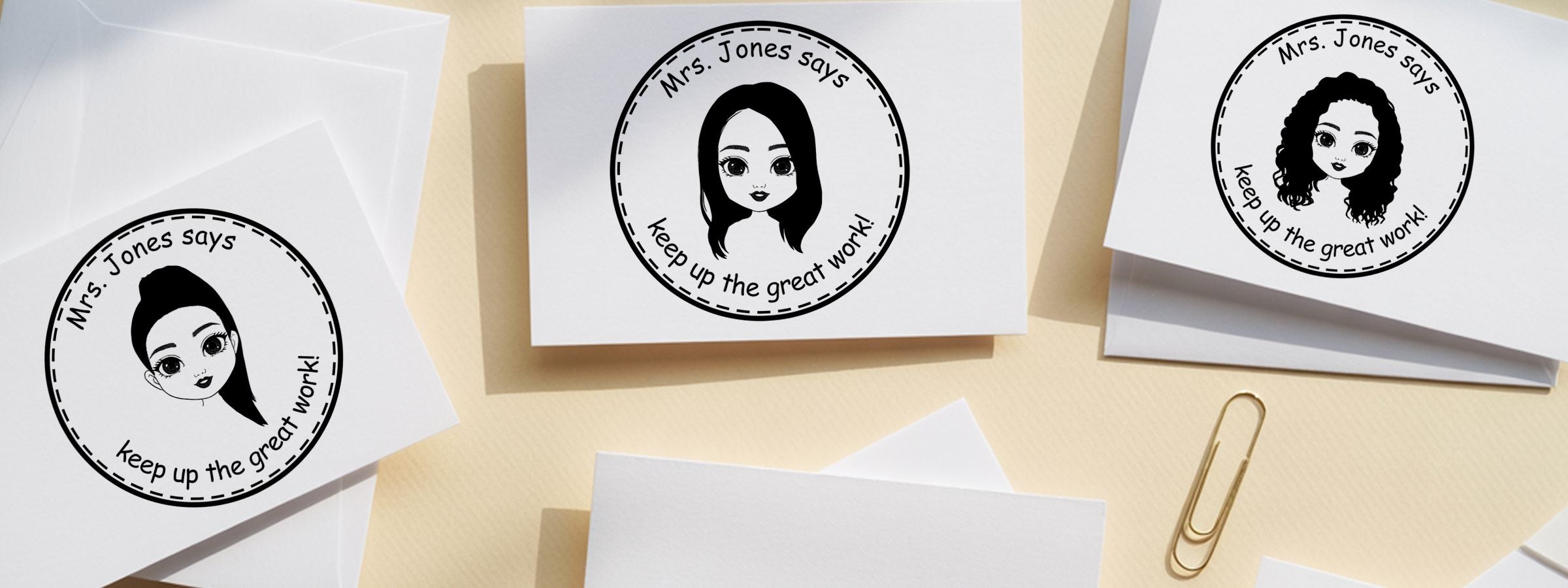 White cards and envelopes with “Mrs. Jones says keep up the great work!” face stickers, gold paper clip, beige background; Bitmoji and Characters Designer Stamps