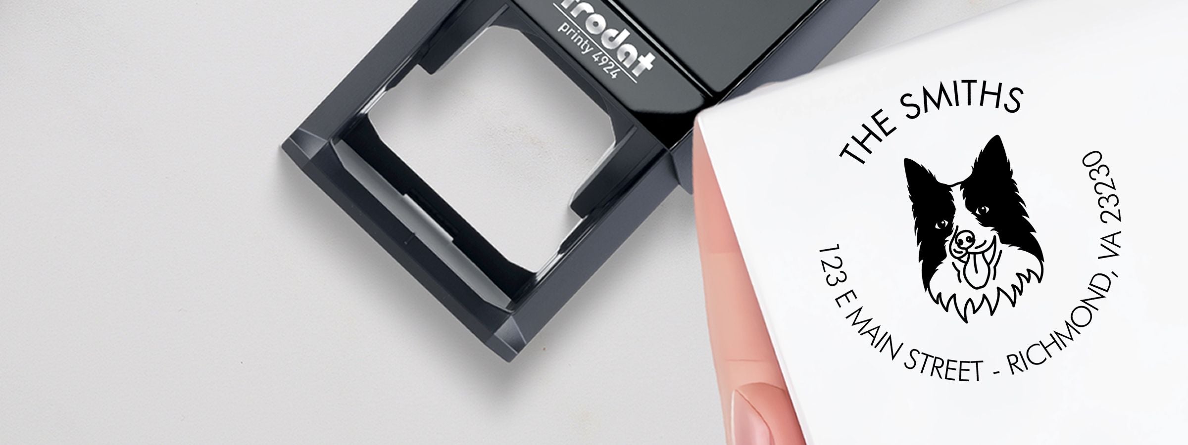 Black self-inking Border Collie Dog Stamps and Custom Seals impression for THE SMITHS with dog logo and Richmond, VA address on white paper.