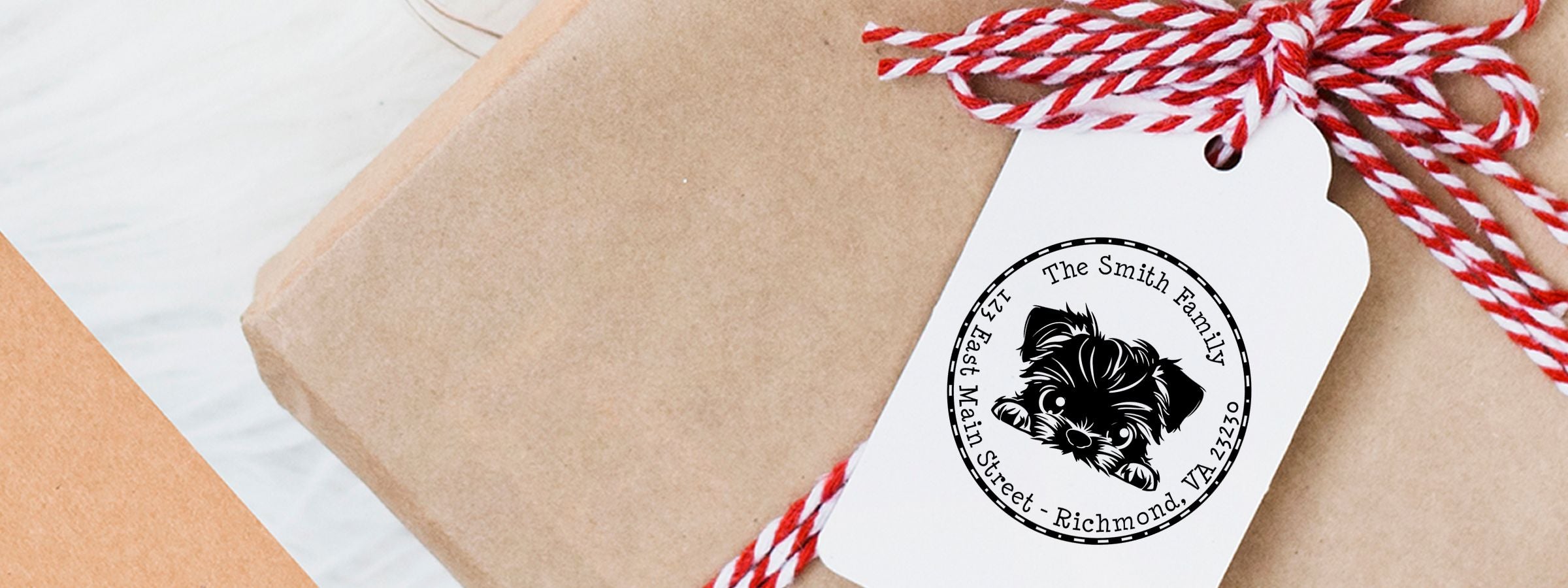 White gift tag with black dog illustration and The Smith Family address design, featuring Brussels Griffon Dog Stamps and Custom Seals.