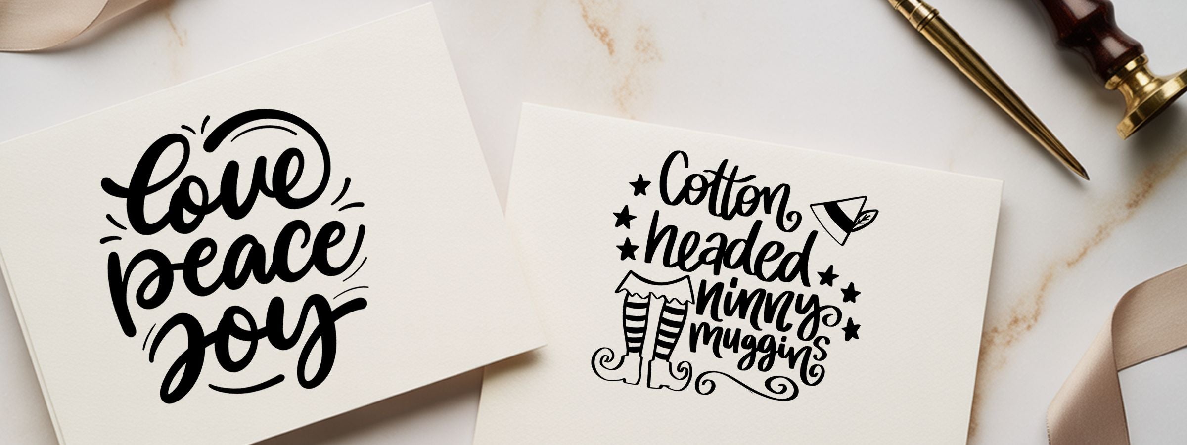 Christmas and Holiday Craft Stamps on white cards with “love peace joy” and “cotton headed ninny muggins,” plus stars, elf legs, and a wax seal.
