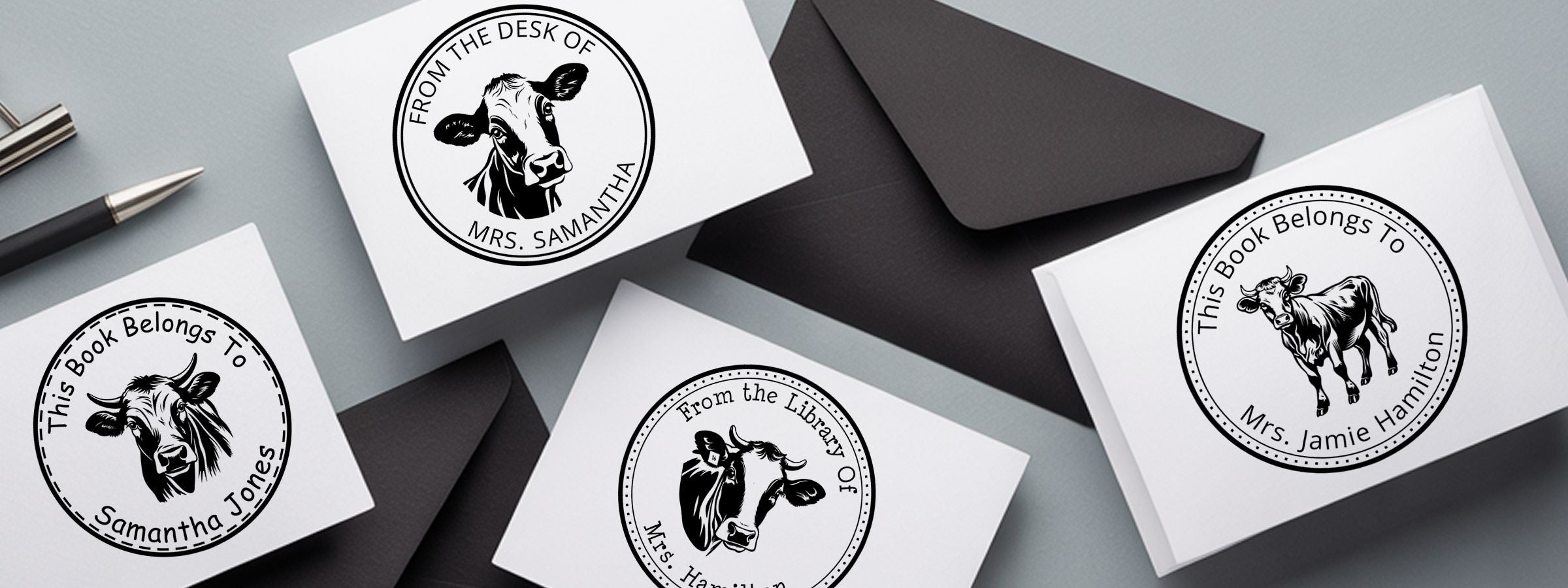 Four personalized bookplate cards with black cow art and envelopes, featuring Farm and Livestock Designer Stamps on a gray background.