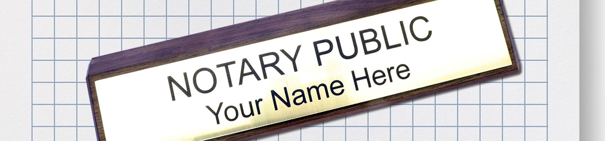 Tilted wooden Notary Public Signs nameplate reading “NOTARY PUBLIC” and “Your Name Here” on graph paper background.