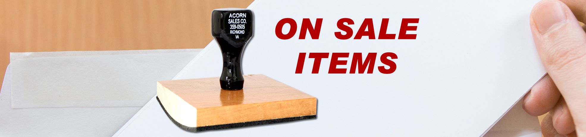 Hand holding a paper stamped “On Sale Items” in red, highlighting On Sale.