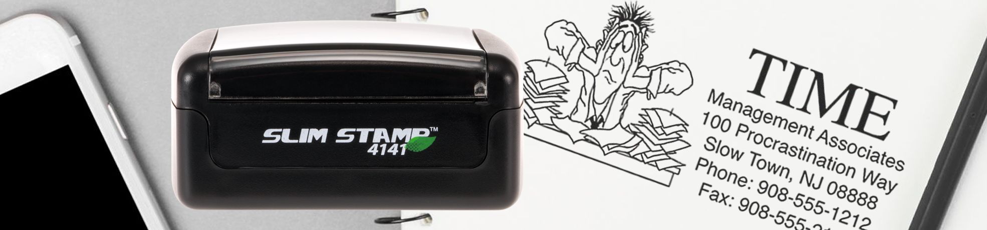 Black self-inking SLIM STAMP 4141 on planner with TIME-style stamp and office contact details, Custom Pre-Inked Stamps.