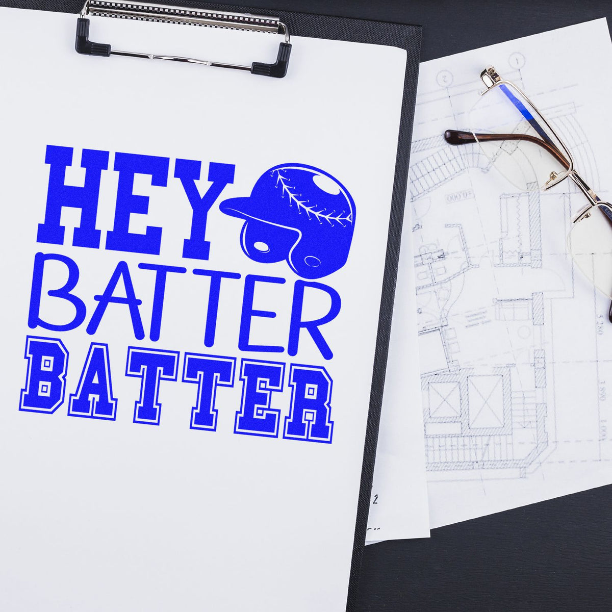 Custom baseball rubber stamp design reading Hey Batter Batter with helmet graphic, ideal for sports-themed branding and packaging.