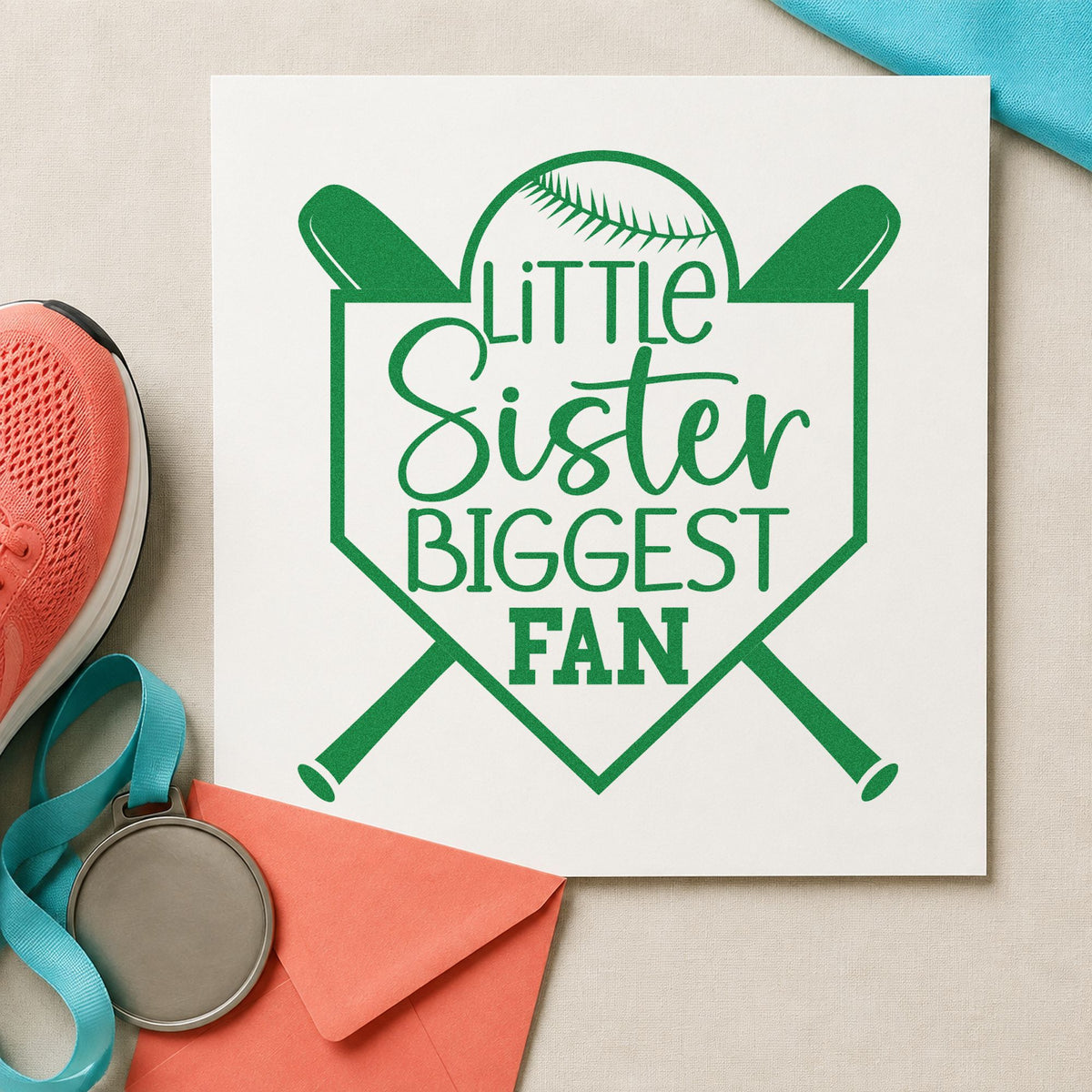 Little Sister Biggest Fan craft stamp imprint in green ink on a handmade project, one idea being family photo captions.