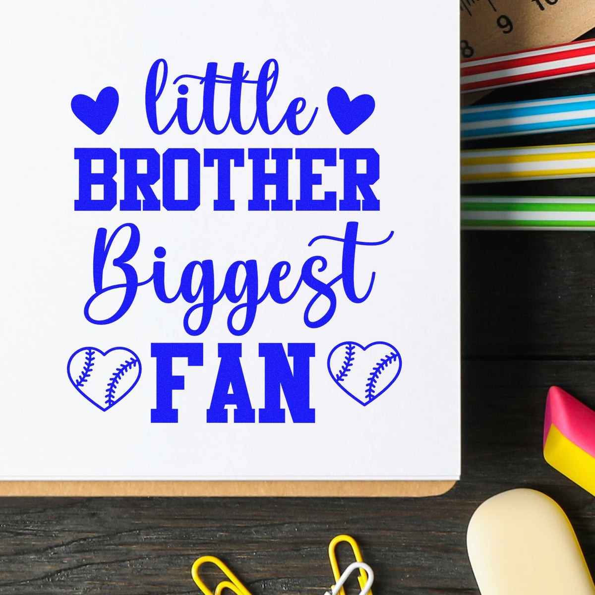 Little Brother Biggest Fan baseball rubber stamp design with hearts, perfect for custom sports crafts and scrapbook projects.