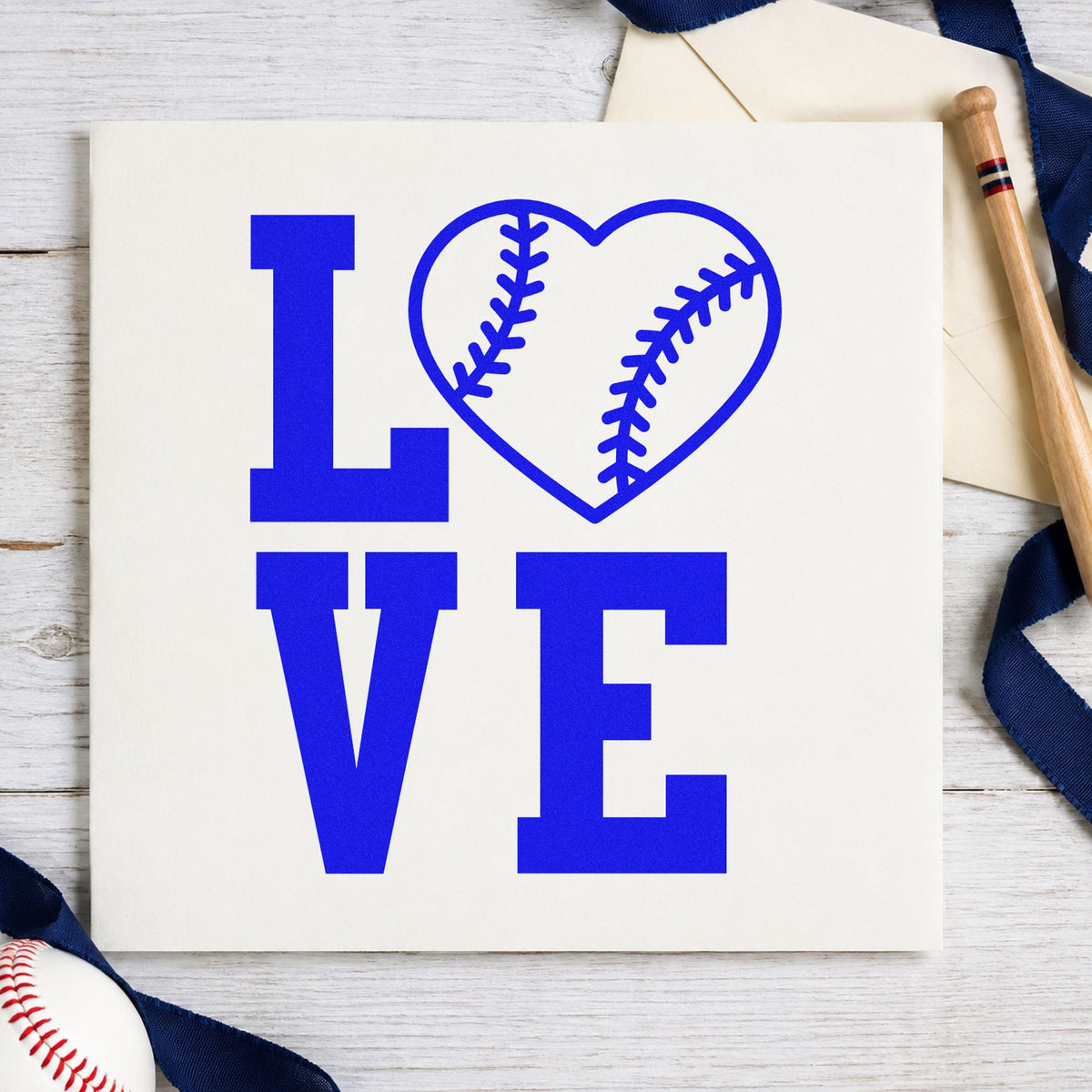 Baseball Heart Love craft stamp in blue ink on cardstock, an easy option for gift wrap pattern.