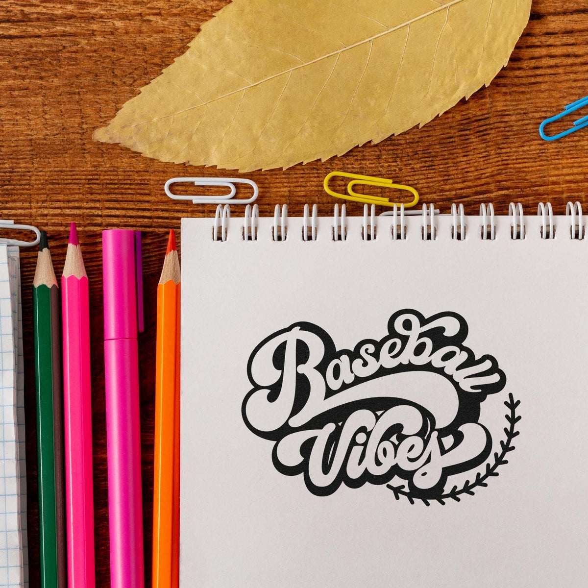 Baseball Vibes rubber stamp design on notebook, perfect for sports-themed scrapbooking, journaling, and DIY crafts.