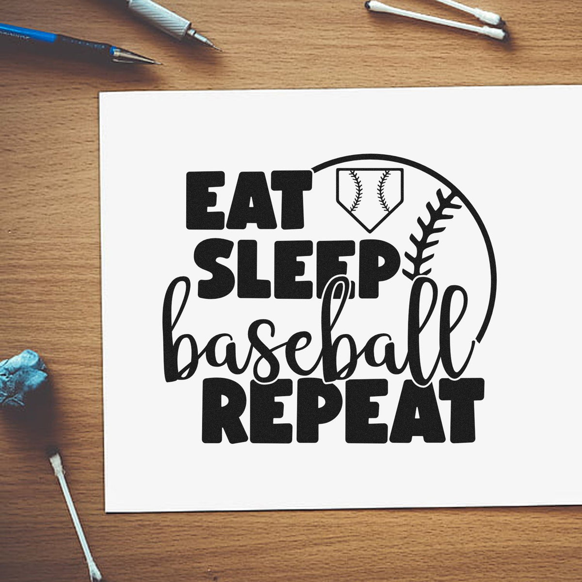 Baseball rubber stamp design with Eat Sleep Baseball Repeat slogan for sports crafts, cards, and team projects.
