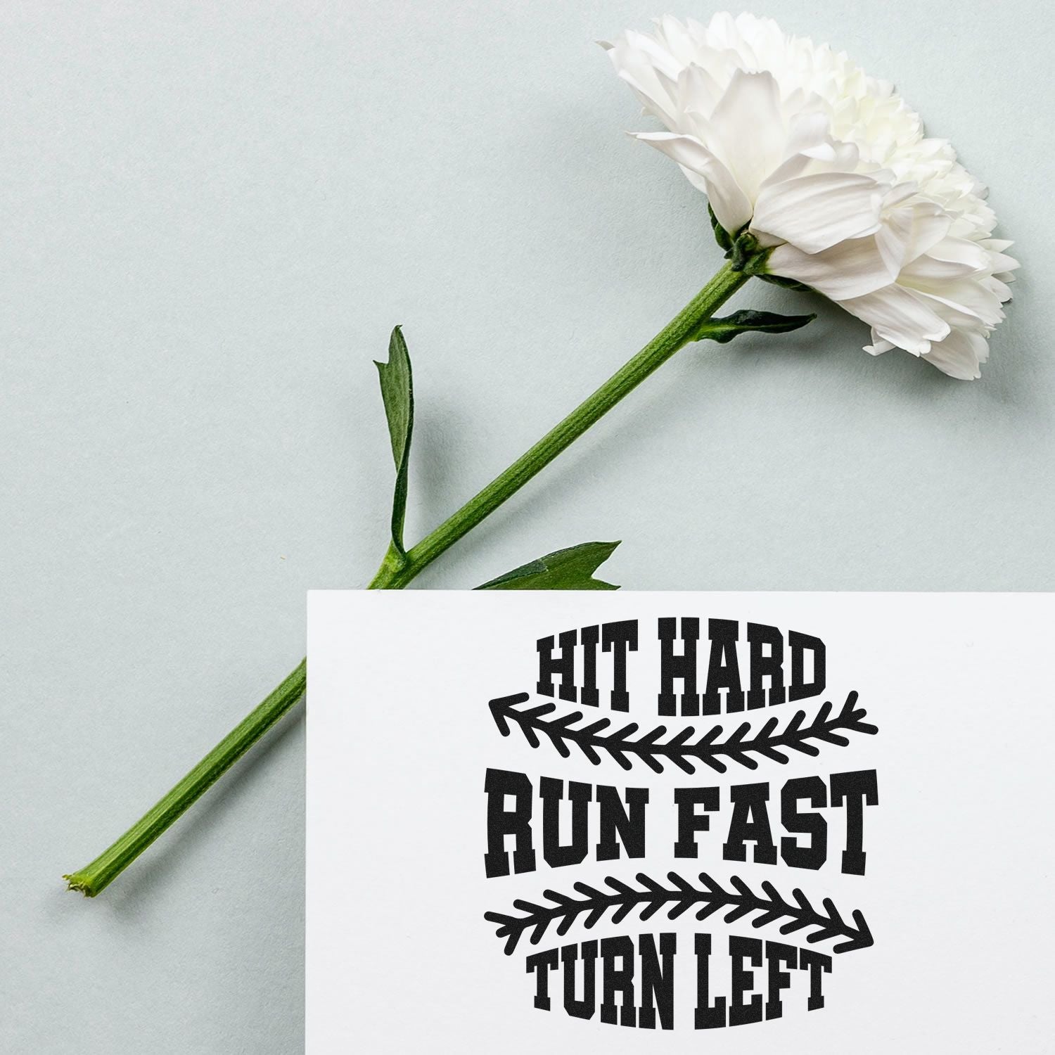 Rubber stamp mockup with bold Hit Hard, Run Fast, Turn Left lettering and arrow graphics.