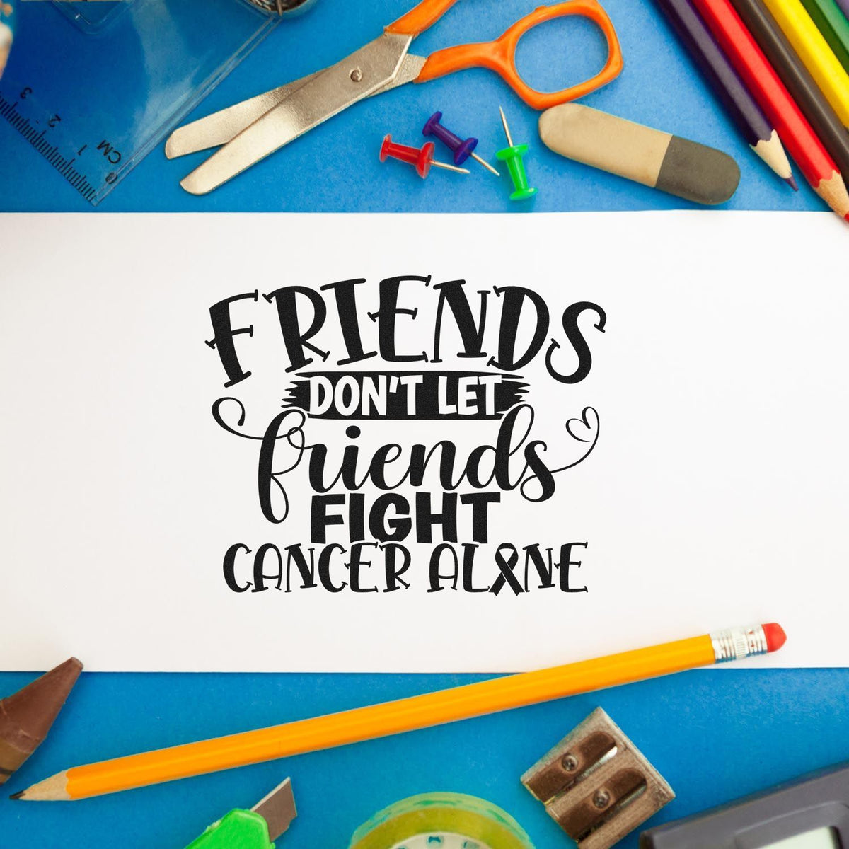 Cancer support rubber stamp design reading Friends Dont Let Friends Fight Cancer Alone for awareness cards and crafts.