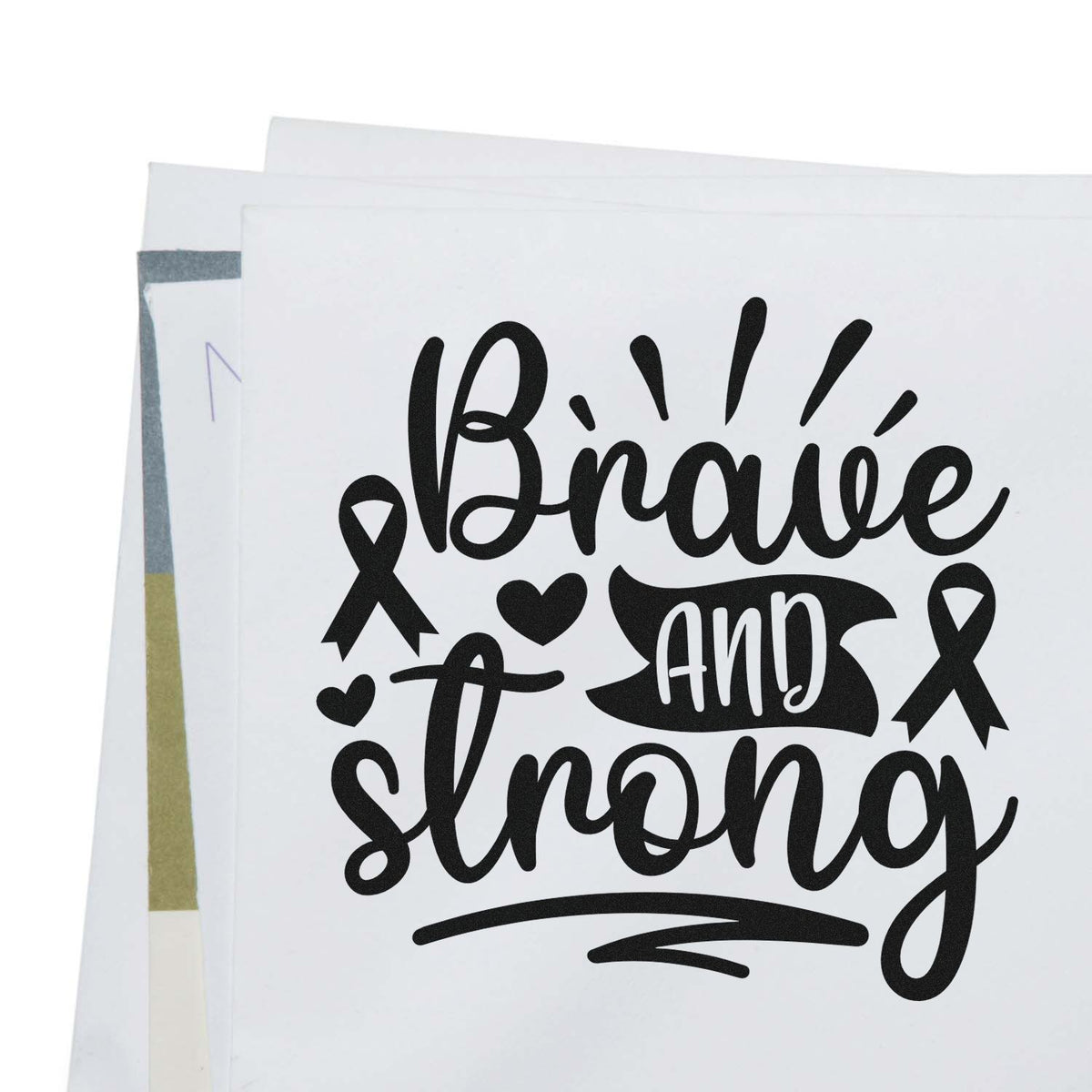 Brave and Strong awareness rubber stamp design with ribbon and heart accents for inspirational craft projects.