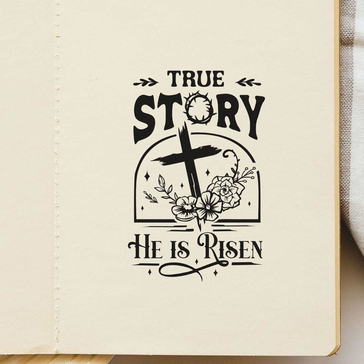 Christian rubber stamp design reading True Story He Is Risen with cross and flowers for Easter cards and faith journaling.