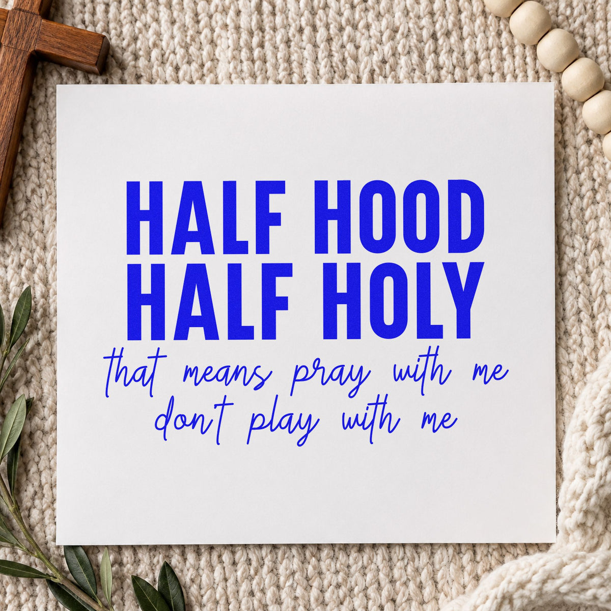 Half Hood Half Holy craft stamp imprinted in blue ink on paper, a design suited to group chat gift sets.