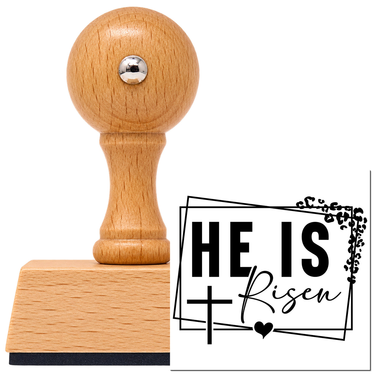 He Is Risen Vintage Pro rubber stamp in European beech wood with a round knob handle, shown beside its black imprint.