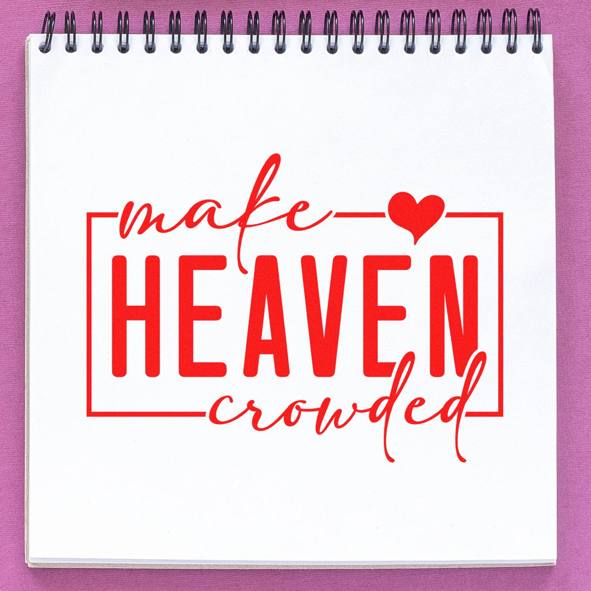 Make Heaven Crowded rubber stamp design for faith-based crafts, featuring a red inspirational quote on a notebook page.
