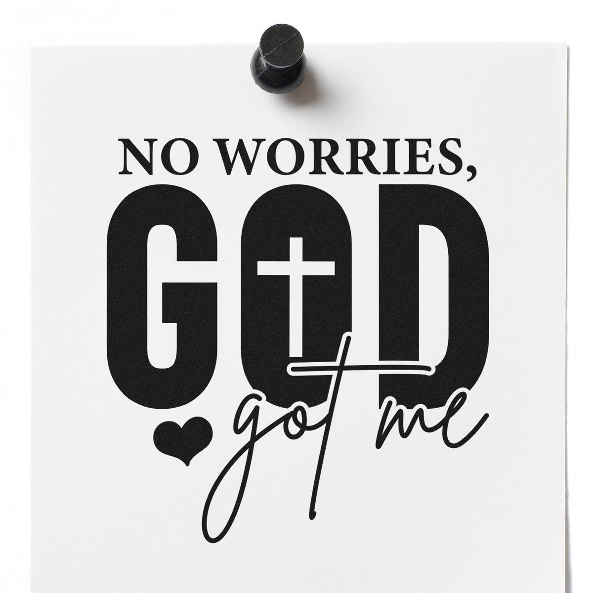 Faith-based rubber stamp reading No Worries, God got me with heart and cross on white paper.