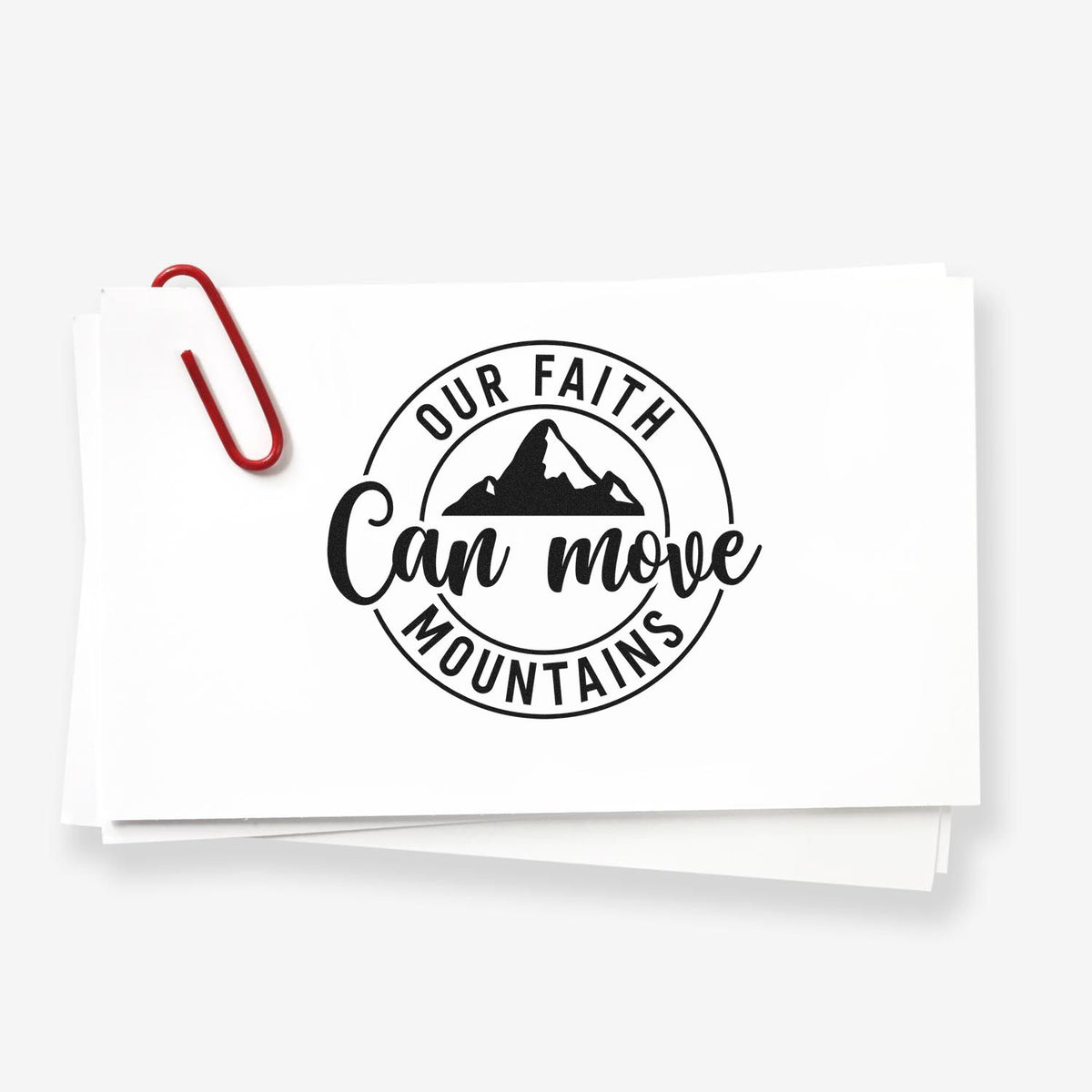 Christian rubber stamp design with Our Faith Can Move Mountains mountain logo, ideal for faith-based crafts and stationery.