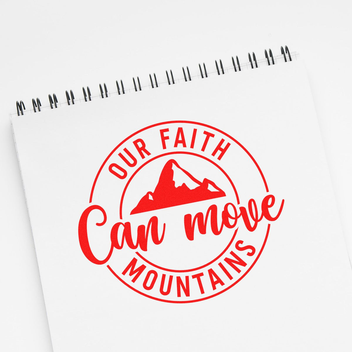 Custom rubber stamp design with Our Faith Can Move Mountains mountain logo for faith-based planners, cards, and crafts.