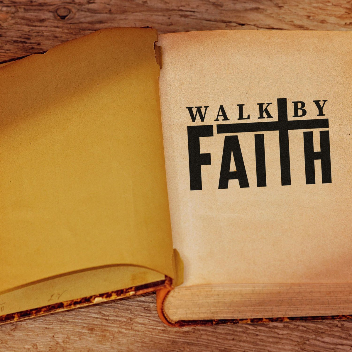 Walk by Faith Christian rubber stamp design stamped in an open book on a rustic wood background