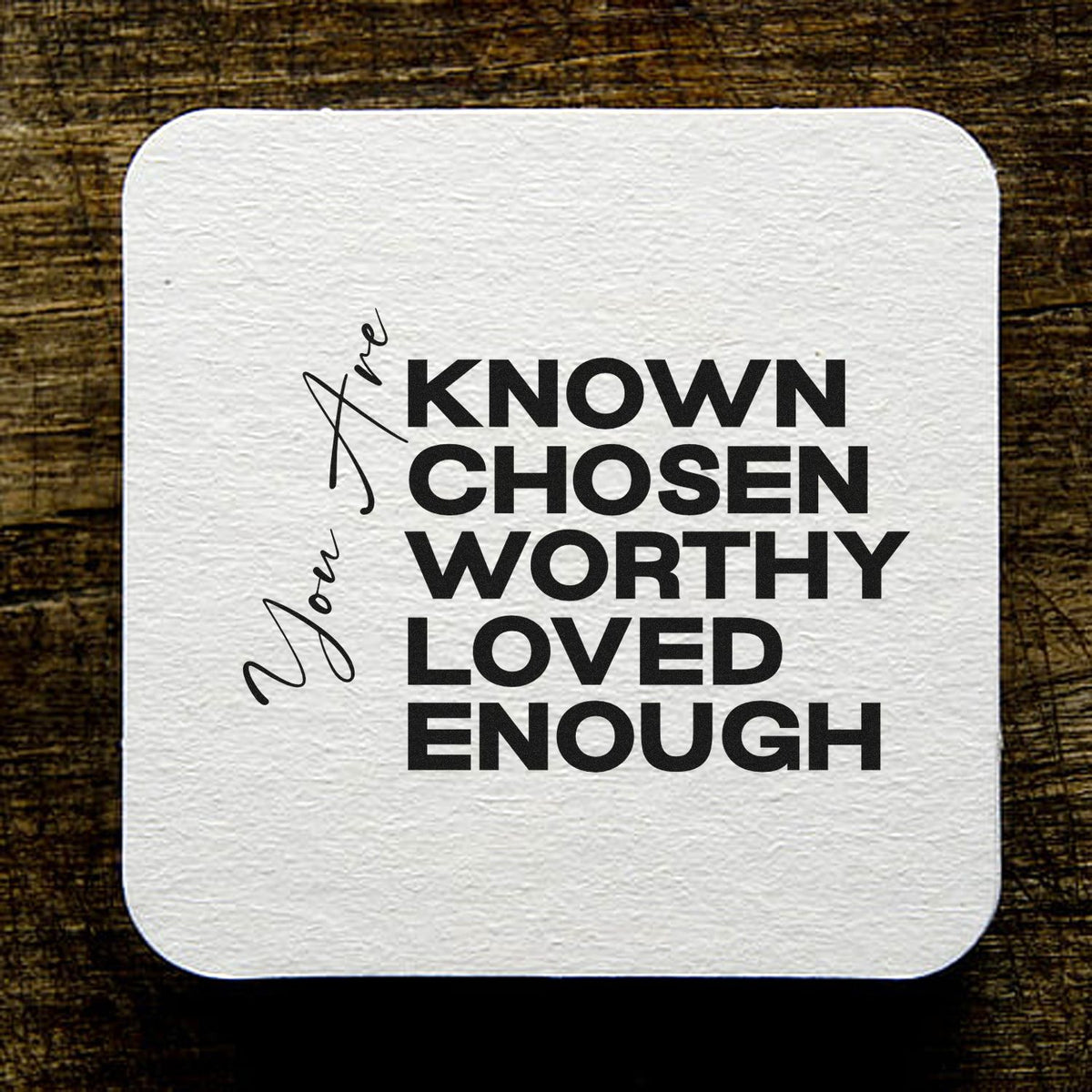 Inspirational rubber stamp design reading Are You Known, Chosen, Worthy, Loved Enough on a white square card.