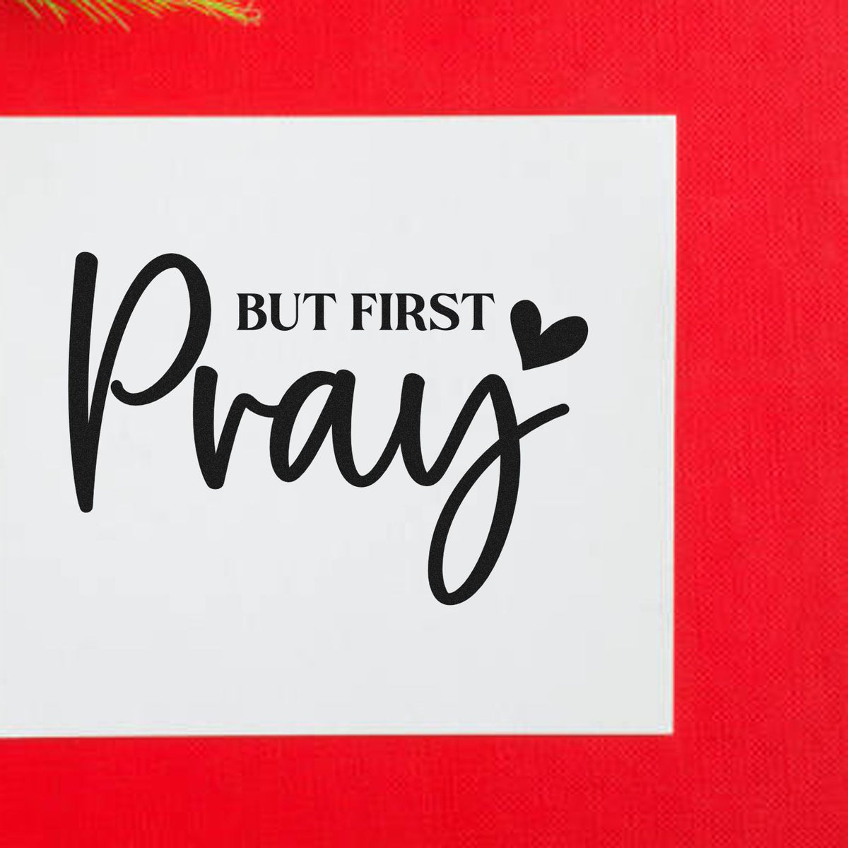 But First Pray rubber stamp design in black script with heart icon on a white background.