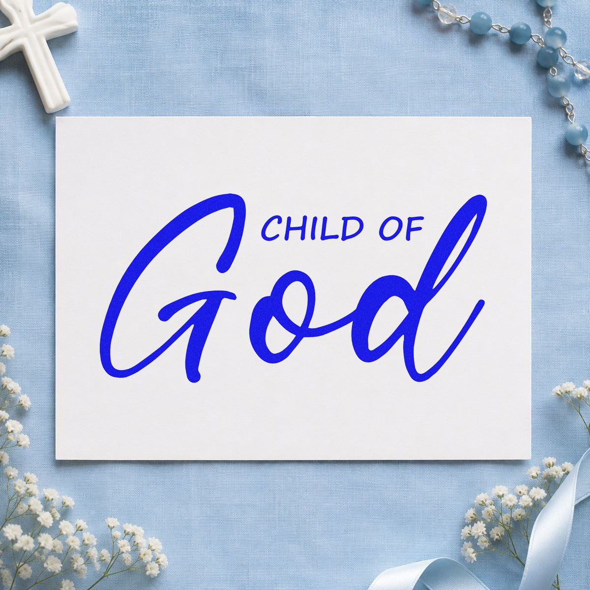 Child of God Script craft stamp in blue ink on cardstock, an easy option for nursery wall art.