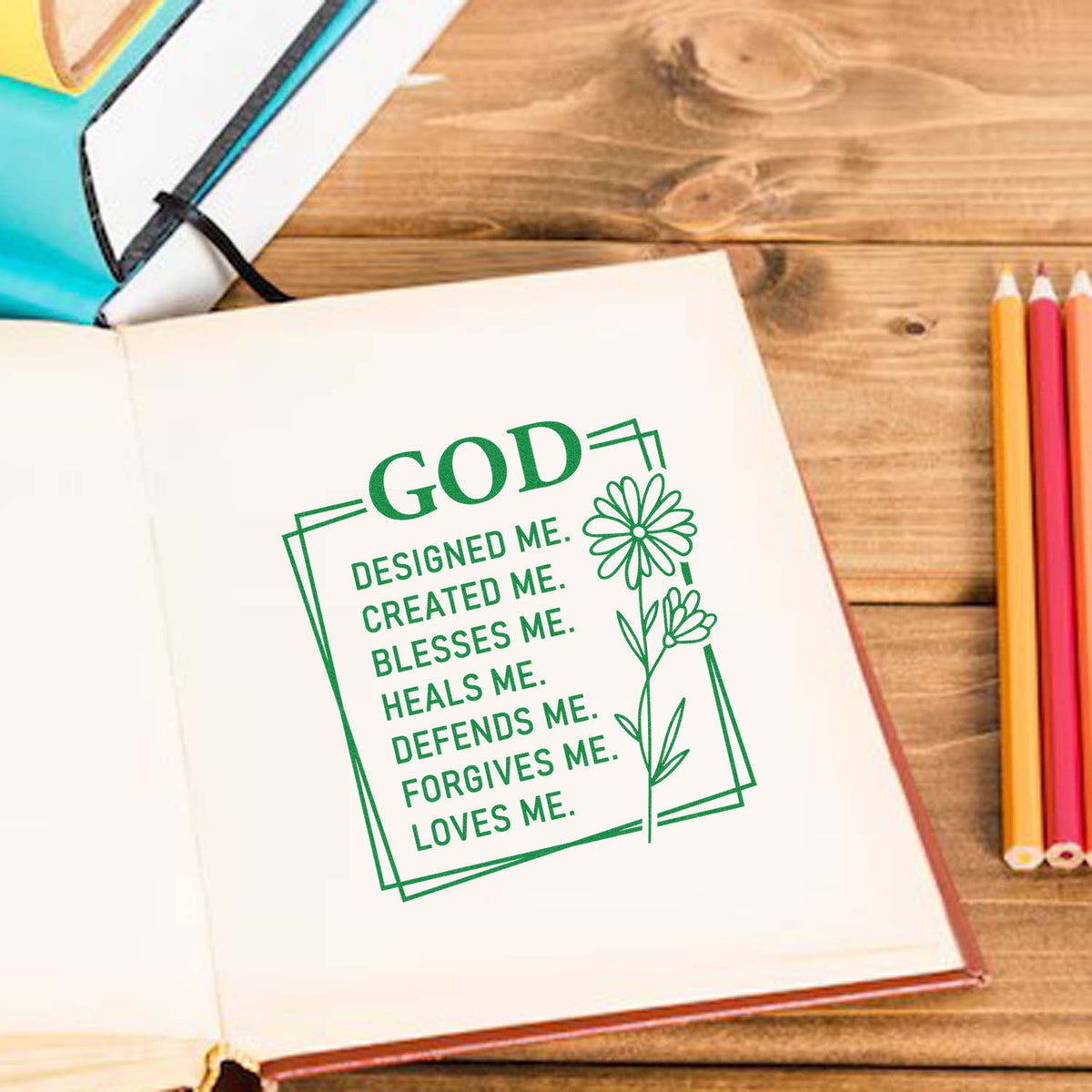 Christian rubber stamp design in a journal with floral quote: God designed me, created me, blesses me, loves me.