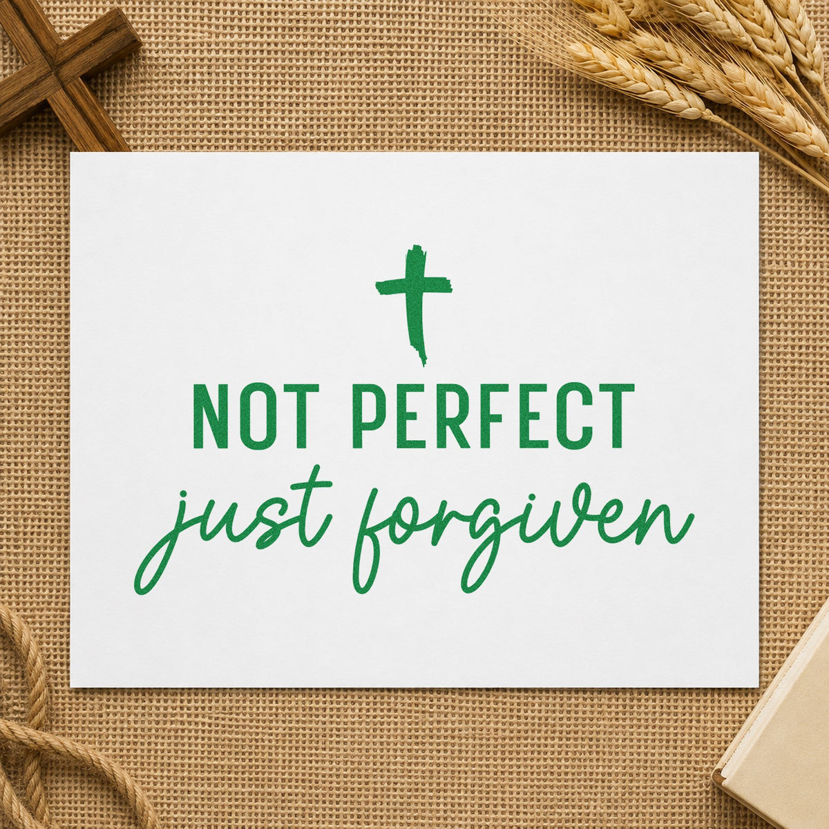 Not Perfect Forgiven Cross craft stamp imprint in green ink on a handmade project, one idea being recovery notes.