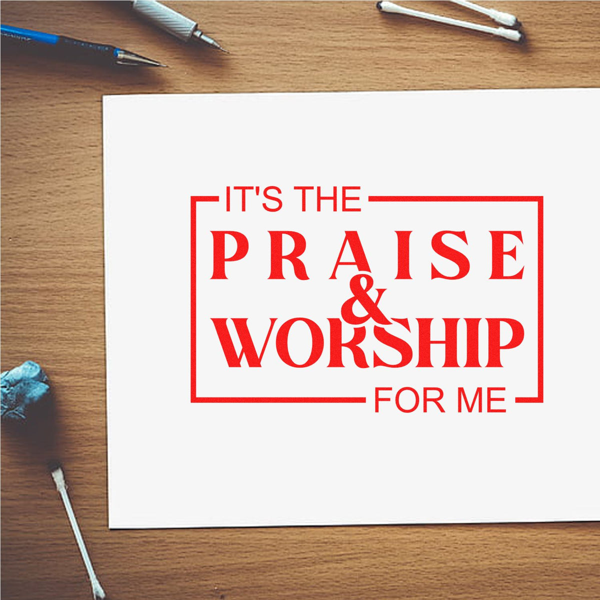 Custom rubber stamp design reading Its the Praise & Worship for Me in red on paper, ideal for church and faith projects.