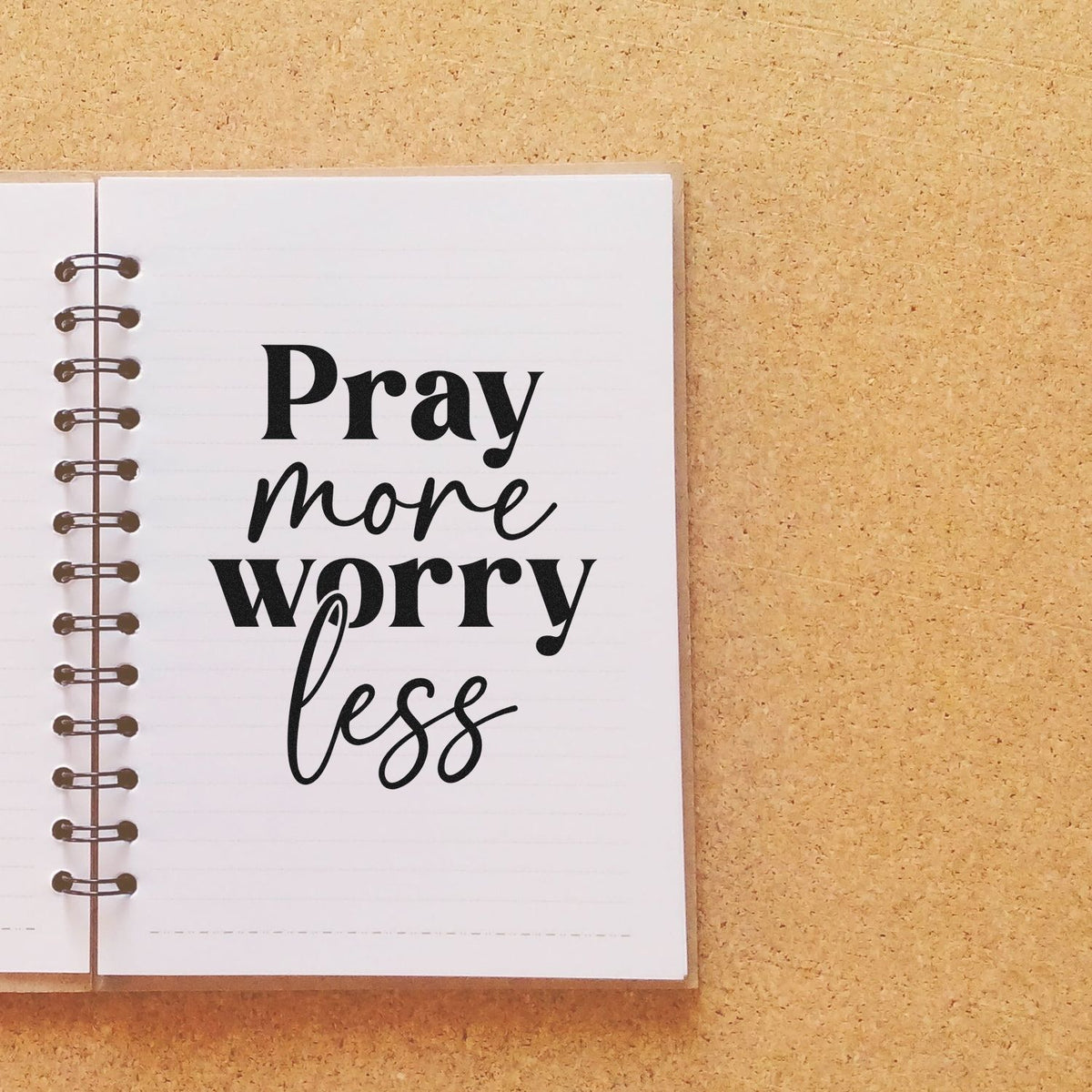 Rubber stamp design reading Pray more worry less for Christian planner, journaling, or faith-based craft projects.