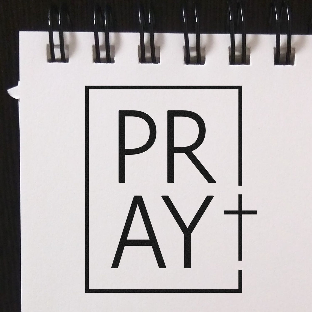PRAY+ custom rubber stamp logo in bold black lettering for faith-based stationery, crafts, and branding.